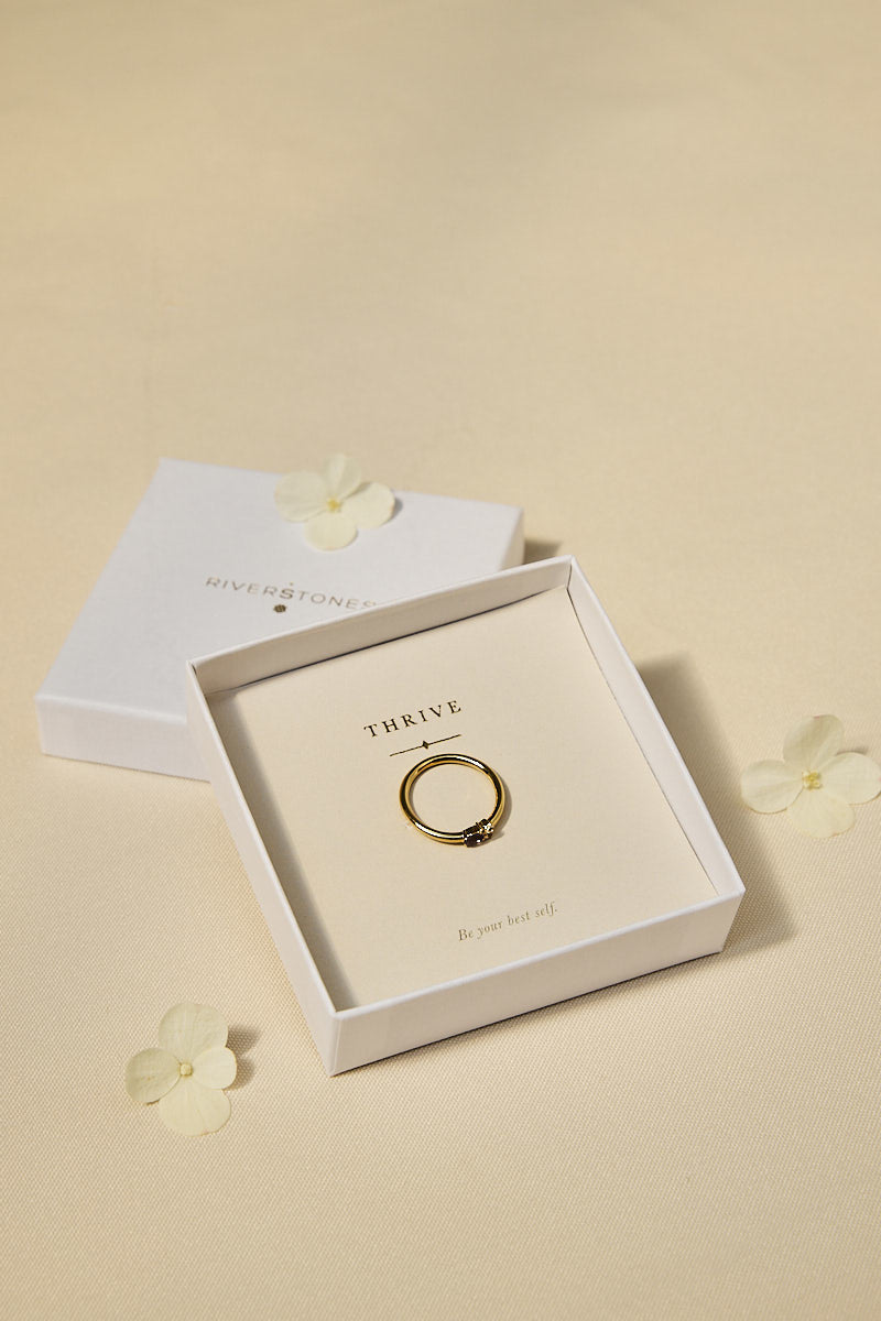 Thrive ring in verpakking